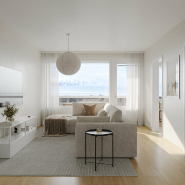 Moderni olohuone, jossa suuret ikkunat, vaalea sohva, minimalistinen sisustus ja näkymä merelle.